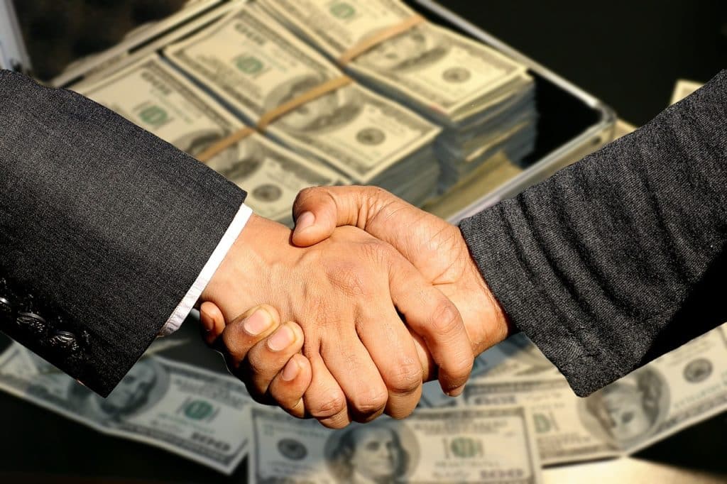 money 1616680689 לחיצת יד